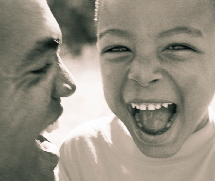 Parent-with-child-pictured-in-sepia